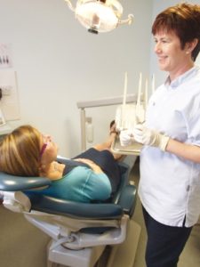 Teeth Whitening Client With Dentist